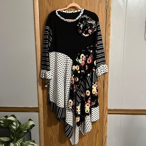 Flower is a custom made flower pin to match shirt